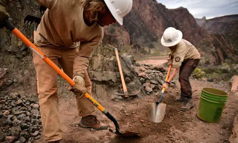 workers repairing a trail